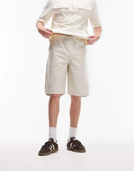 leather longline short in stone