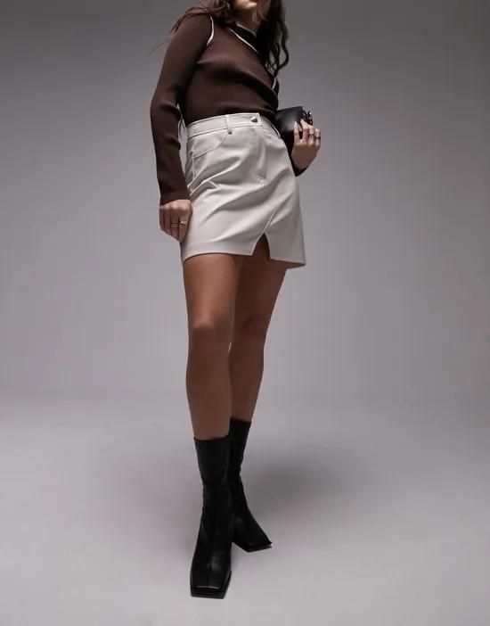 leather look denim styled mini skirt in ecru