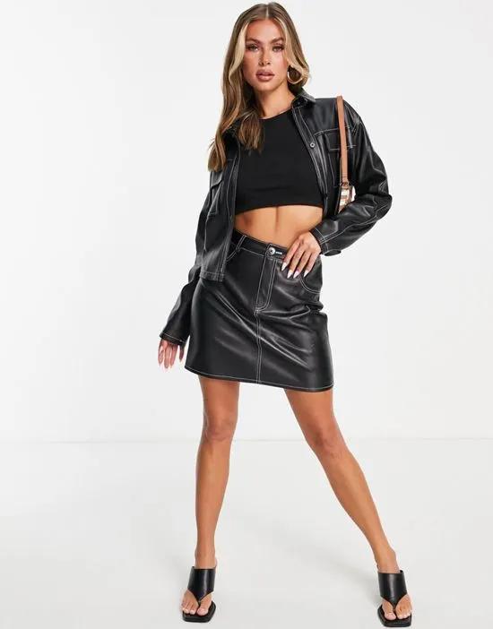 leather look mini skirt in black - part of a set