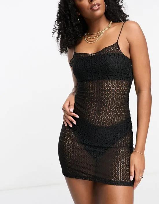 light knit mini cami beach dress in black with gold colored back chain