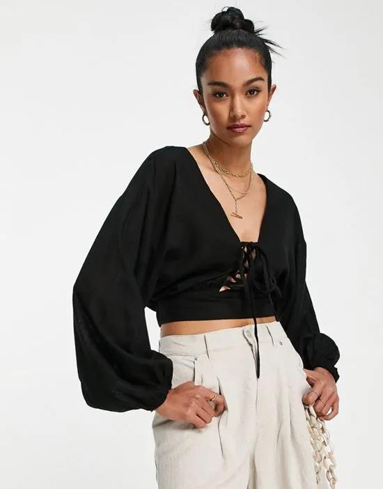 linen top with lace up front & volume sleeve in black