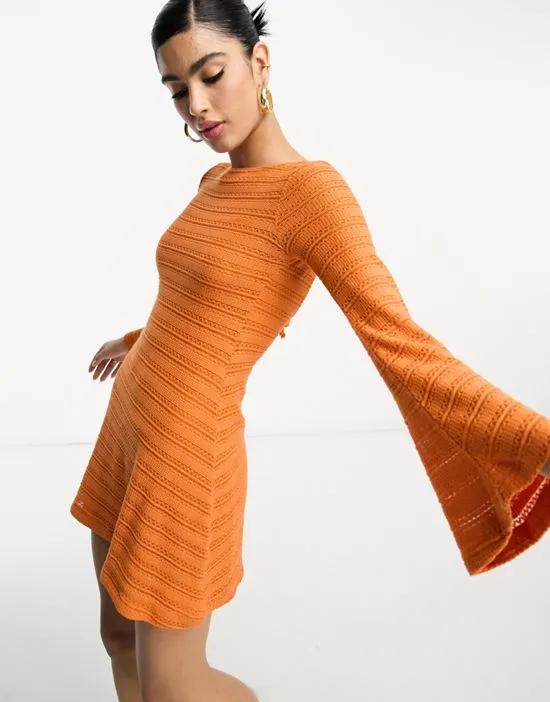 long sleeve mini crochet dress with flare cuff in orange