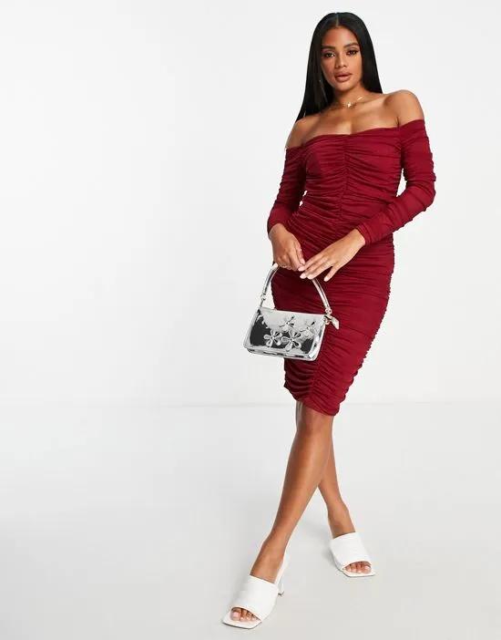 long sleeve off shoulder ruched midi dress in burgundy
