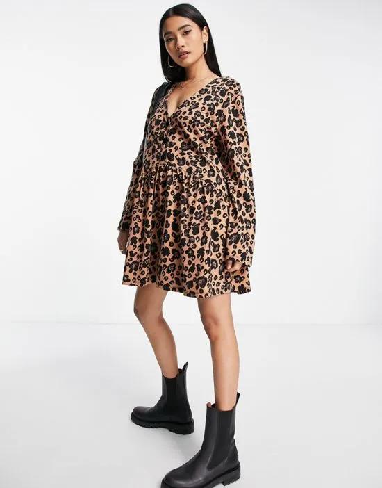 long sleeve smock mini dress with buttons in leopard print