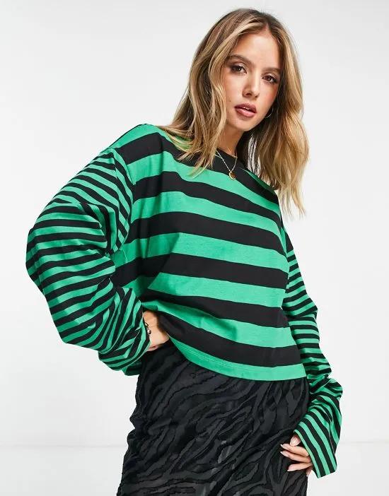 long sleeve T-shirt with wide sleeve in mixed green and black stripe