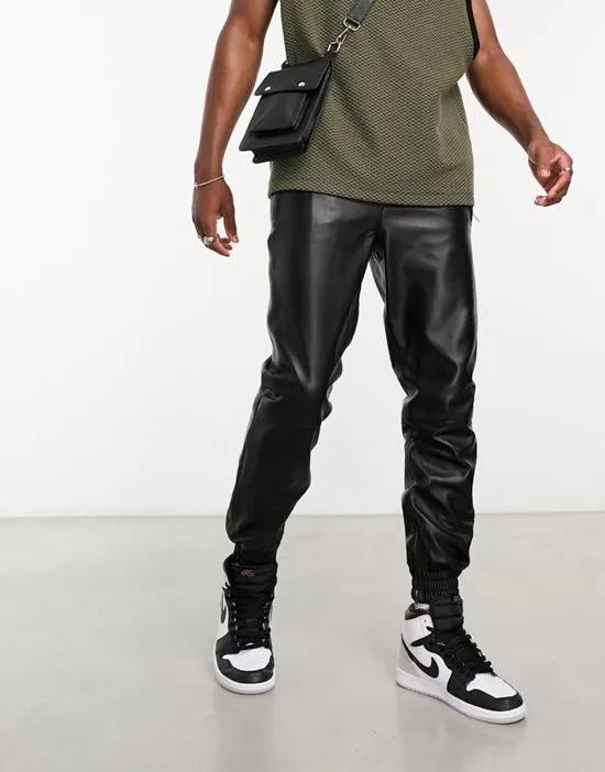 loose fit leather sweatpants with zipped pockets