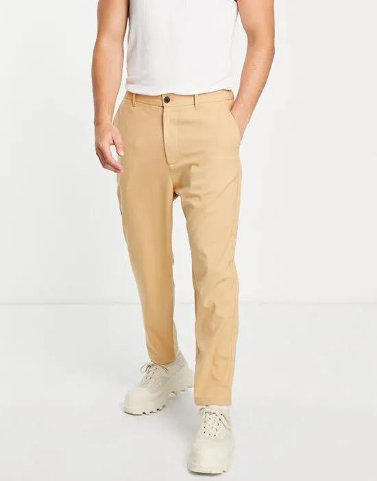 loose tailored pants in camel