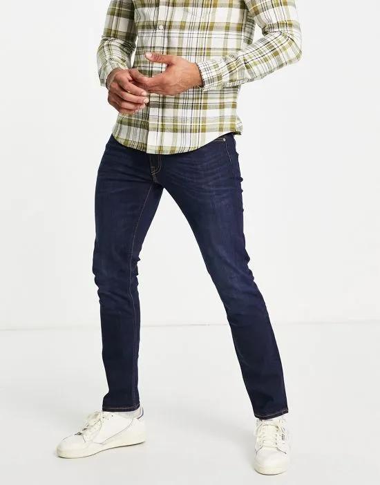 Luke slim tapered fit jeans in mid wash