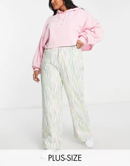 mid rise a-line printed jeans in purple and green wave print