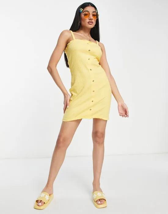 mini button up ribbed dress with frill hem in yellow