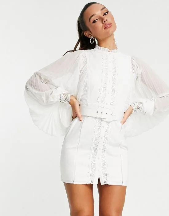 mini dress with pleated sleeve and guipure lace trim in white