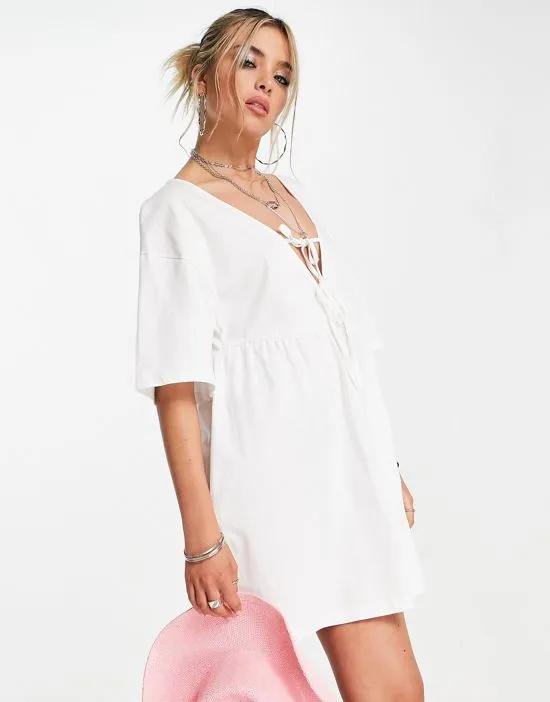 mini smock dress with double tie detail in white