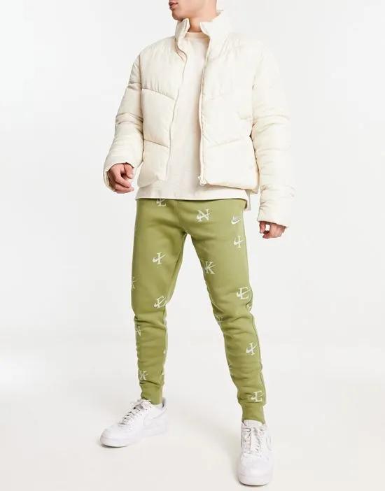 Monogram print joggers in green