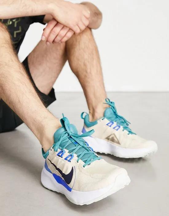 Nike Trail Juniper 2 sneakers in stone and blue