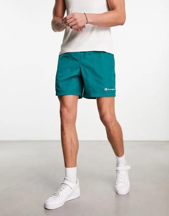 nylon warm up shorts in teal
