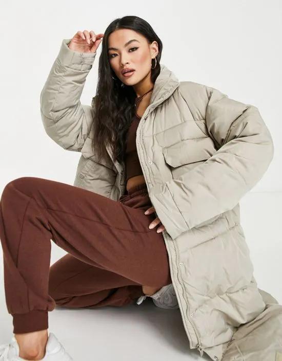 oversized longline puffer coat with pocket detail