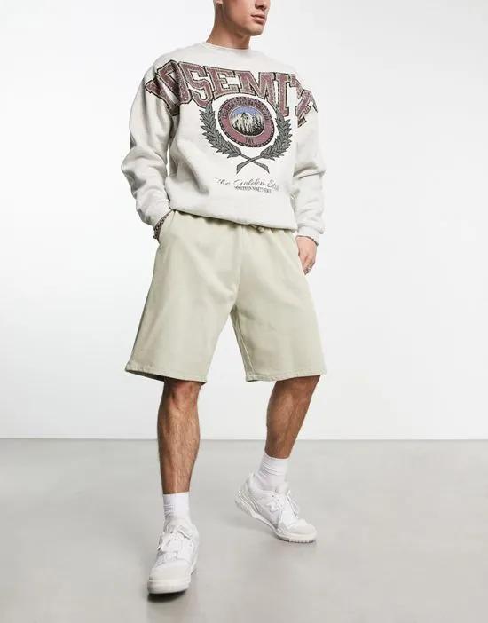 oversized shorts in beige acid wash