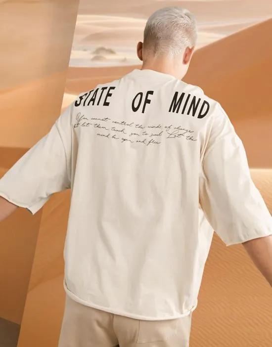 oversized T-shirt in beige with back text print