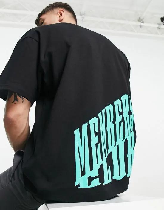 oversized t-shirt in black with neon green placement print