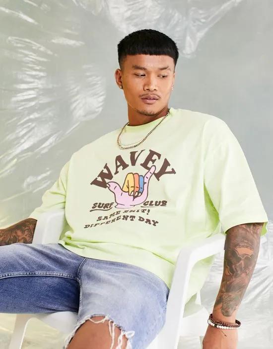 oversized t-shirt in light green with wavey chest print