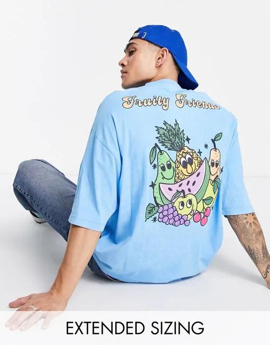 oversized t-shirt in washed blue with cartoon fruit back print