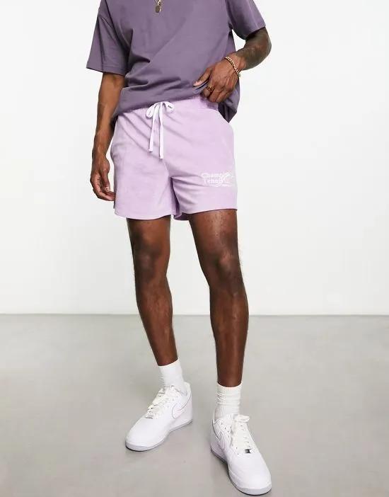 oversized terrycloth shorts in purple with embroidery
