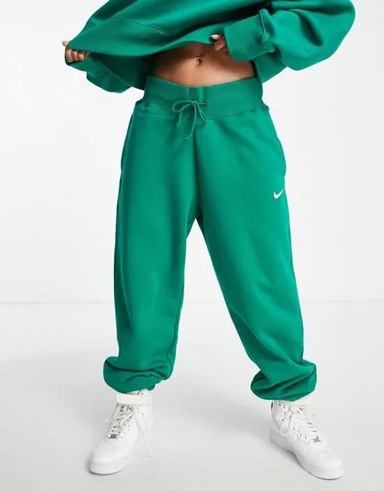 Phoenix Fleece sweatpants in green - MGREEN