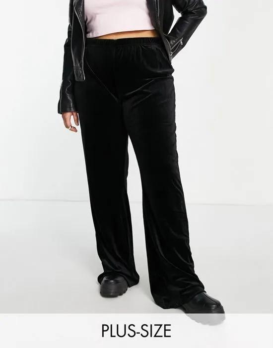 Pieces Curve high waisted velvet flared pants in black