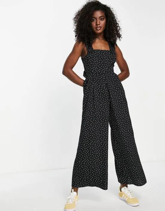 pinafore frill cross back jumpsuit in mono spot print