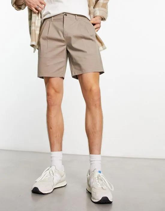 pleated shorts in light gray