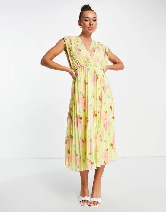 pleated wrap front midi dress in yellow floral