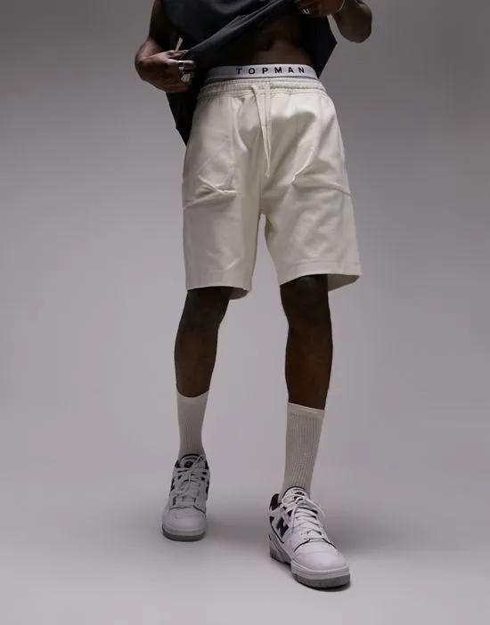 premium zip pockets cargo short in ecru