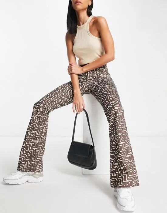 puddle flare pants in chocolate wavy print
