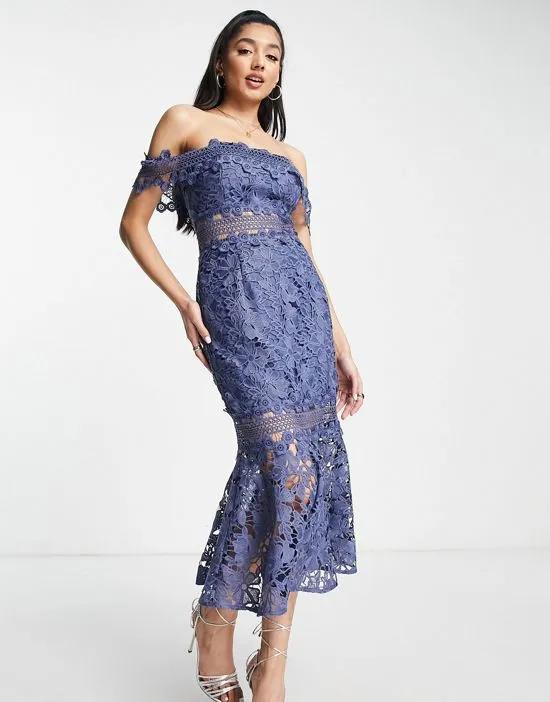 puff sleeve lace midi dress with button detail and lace inserts in blue