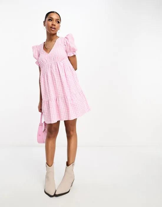 puff sleeve tiered smock dress in textured gingham