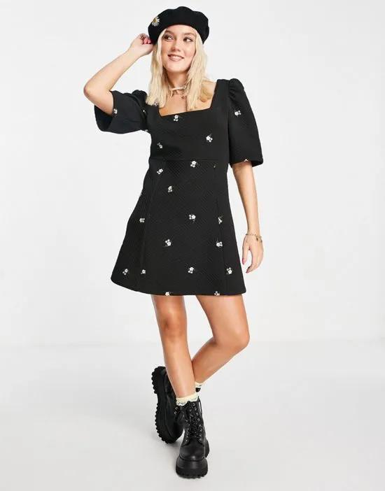 quilted mini dress with flower embroidery in black