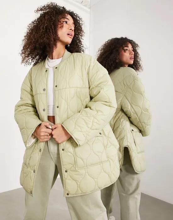 quilted reversible jacket in khaki and stone