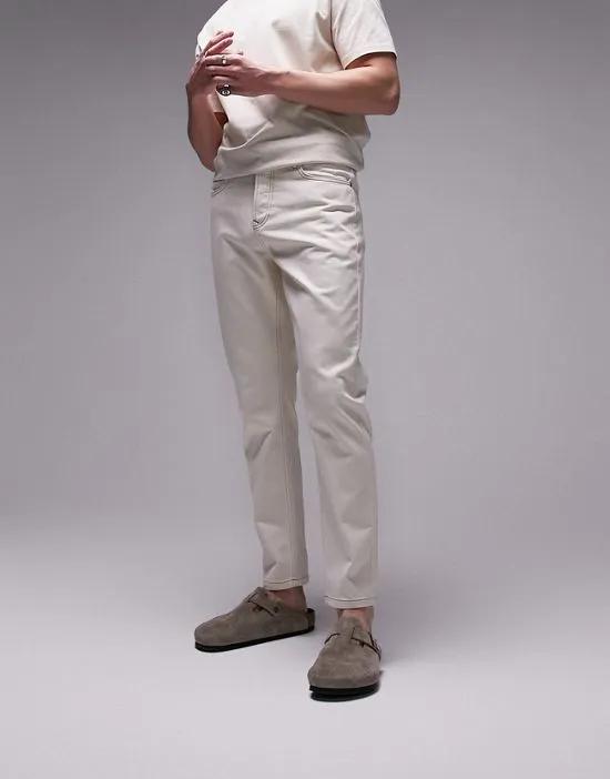 rigid tapered jeans in ecru