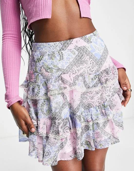 ruffle tiered mini skirt in mixed paisley floral print