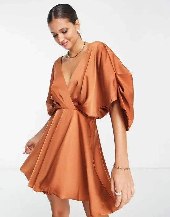 satin batwing mini dress with pleated bodice detail in rust
