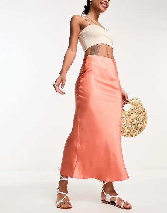satin bias midi skirt in apricot