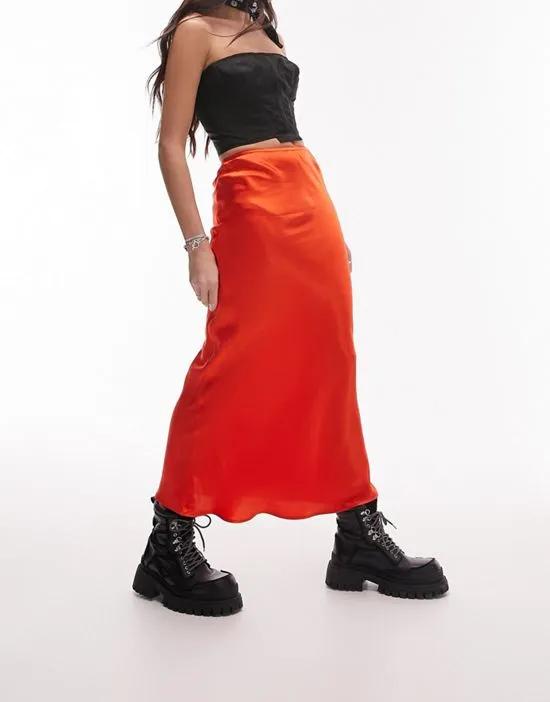 satin bias midi skirt in bright red