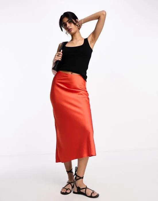 satin bias midi skirt in orange