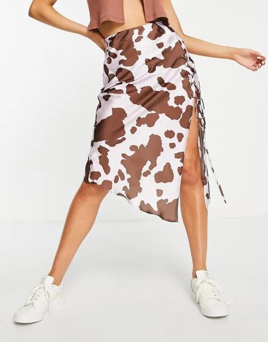 satin lace up midi skirt in cow print