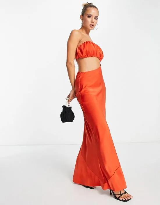 satin ruched bust maxi dress with asymmetric cut out in hot orange