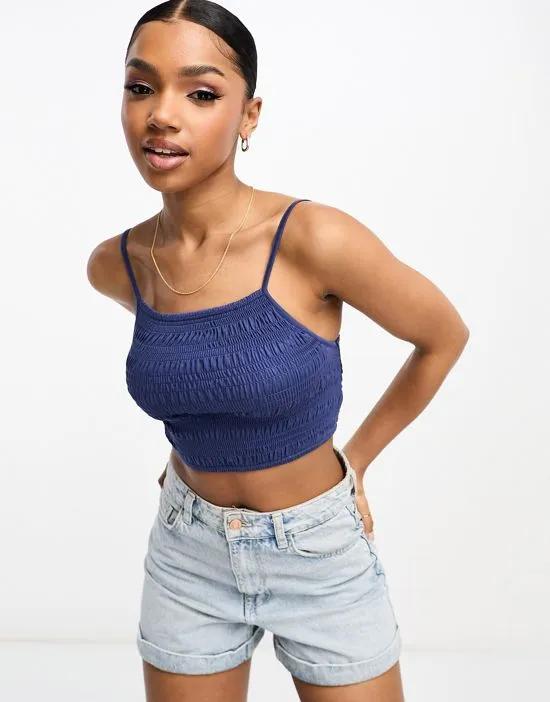 shirred strappy crop top in navy blue