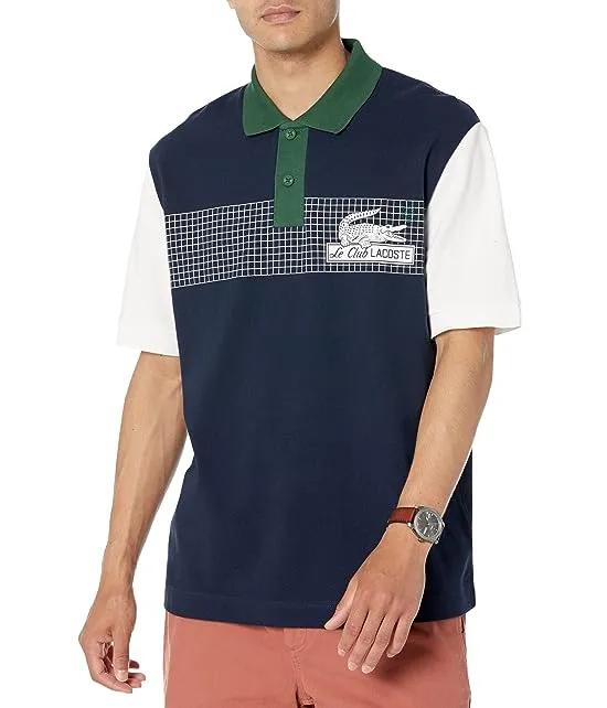 Short Sleeve Loose Fit Pique Graphic Polo Shirt