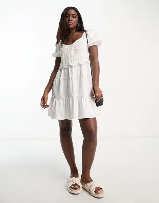 short sleeve mini tiered smock dress with crochet detail in ivory