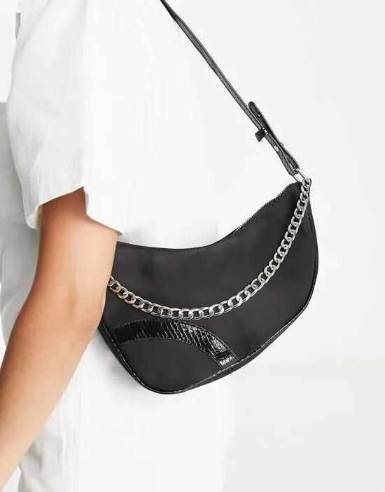 shoulder bag in black nylon with patent trim and silver chain