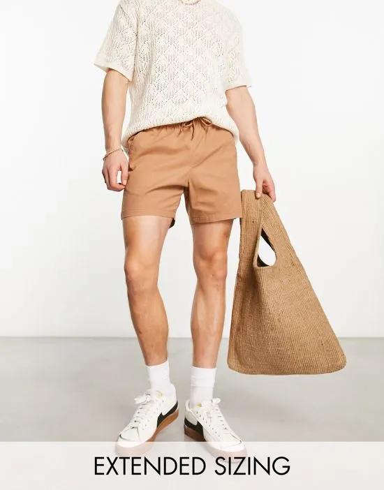 skinny chino shorts in tan